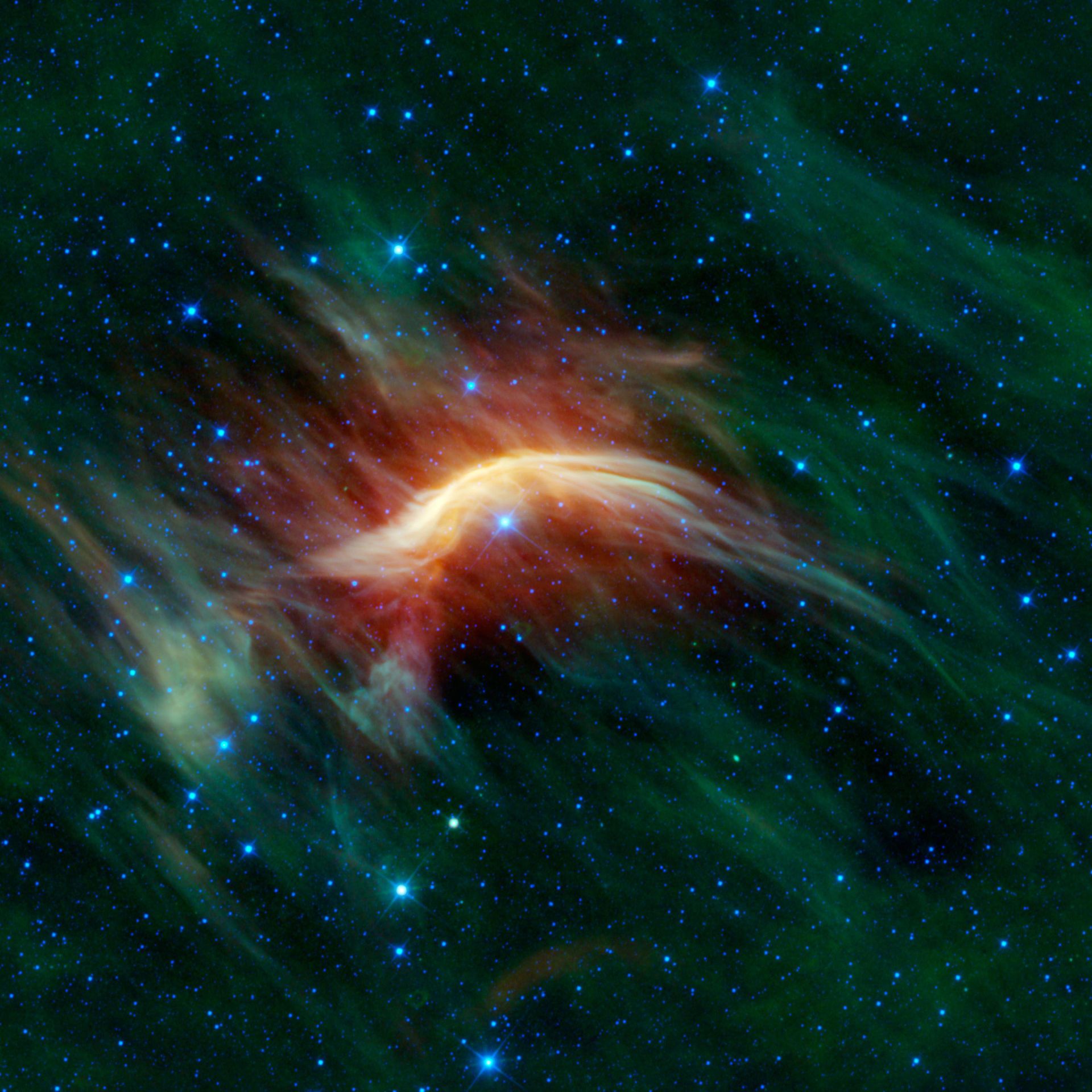 Ударная волна, образующаяся во время движения в межзвездном пространстве убегающей звездой Дзета Змееносца