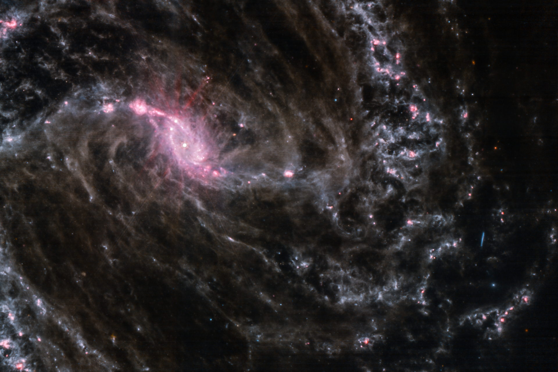 Спіральна галактика з подвійною перемичкою NGC 1365