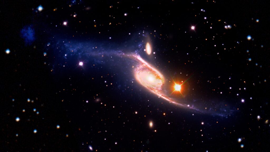 Композиция гигантской спиральной галактики с перемычкой NGC 6872