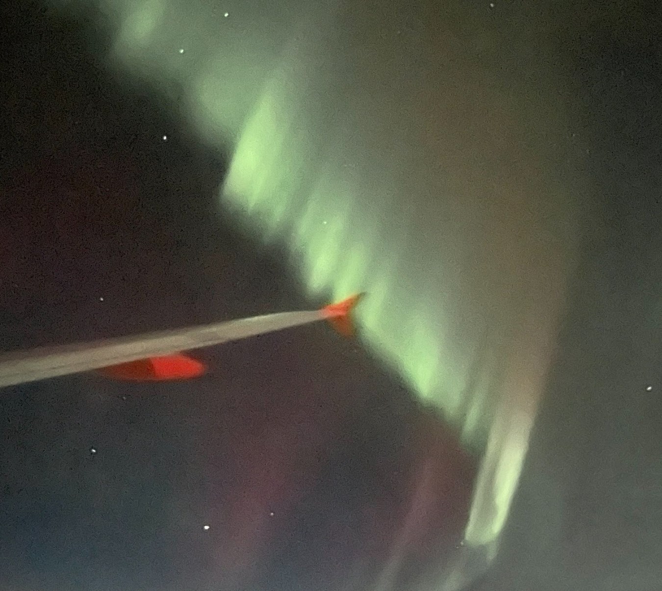Фотографія полярного сяйва з борту літака