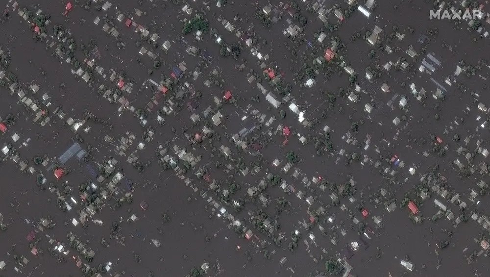 Супутниковий знімок затоплених будинків