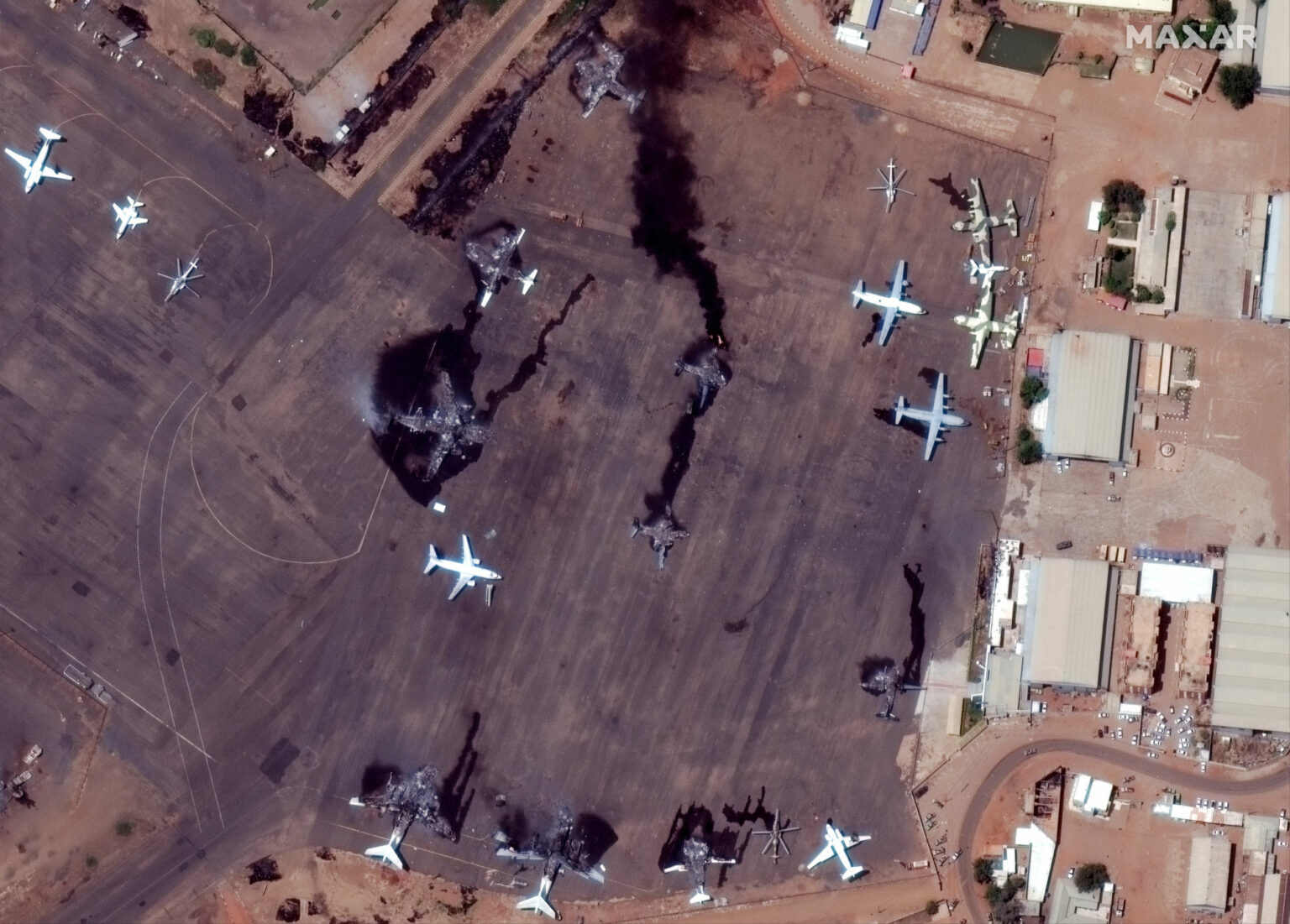 https://universemagazine.com/wp-content/uploads/2023/12/02_closer-view-of-destroyed-airplanes-at-khartoum-intl-airport_sudan_17april2023_wv3-2000x1434-1.jpg