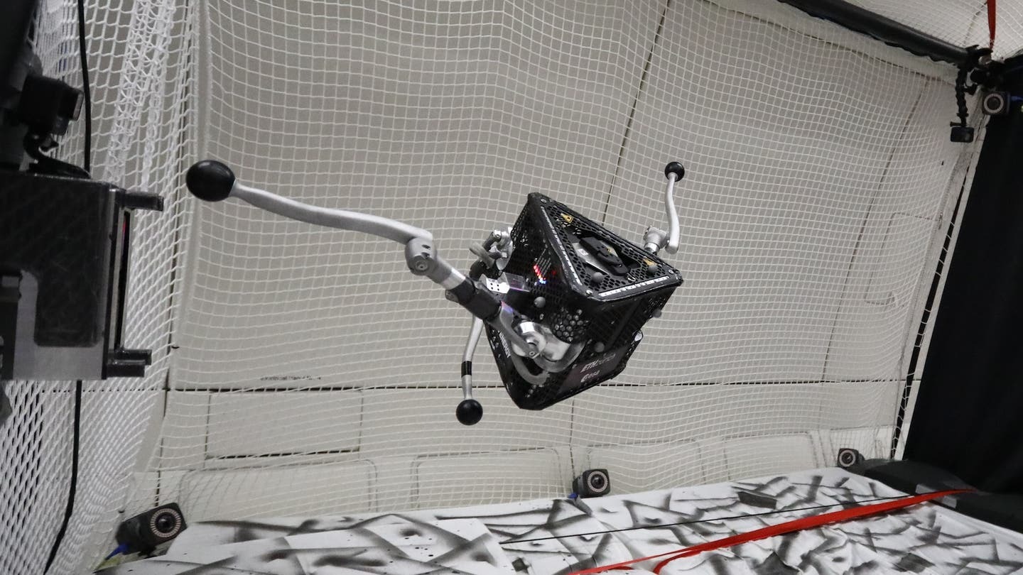 A three-legged robot independently learned to move in zero gravity: video