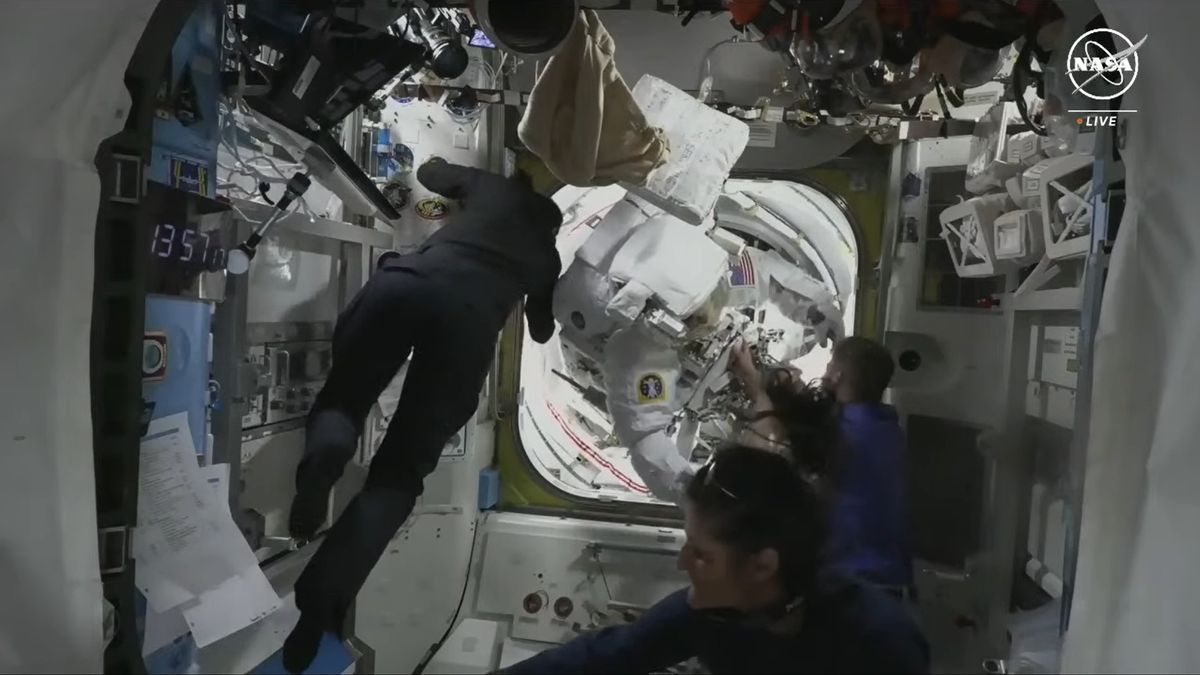 A spacewalk is stopped due to a spacesuit leak