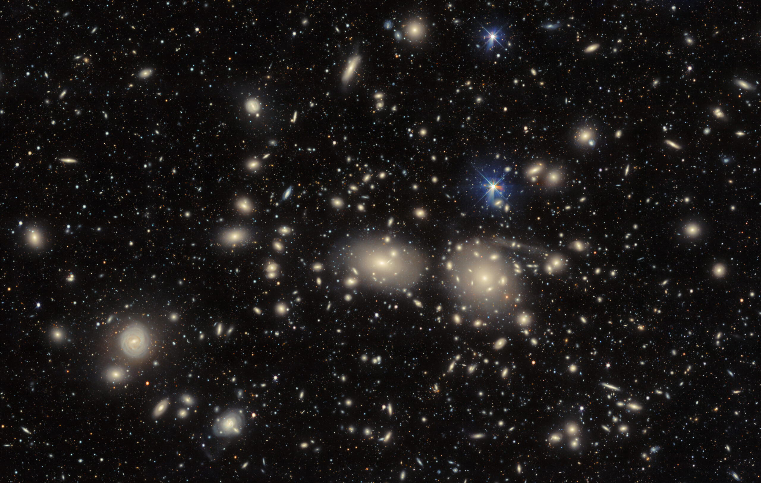 Tied by dark matter: Astronomers photograph Coma Cluster